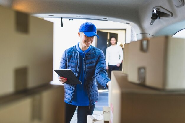 Young-woman-delivering-mail-client
