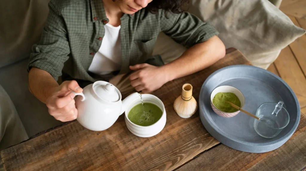Man enjoying a cup of matcha tea